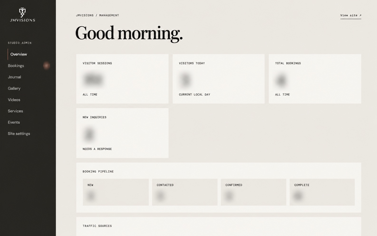 JMVisions admin overview with visitor analytics and booking pipeline values obscured